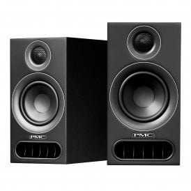 Pair of compact black PMC bookshelf speakers placed side by side on a white background.